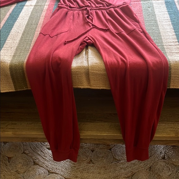 Red Wrap-Style Jumpsuit with Tie Waist and Wide-Leg Design - Picture 2 of 4